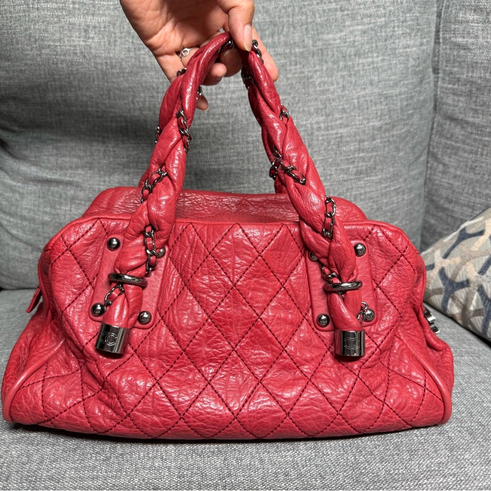 CHANEL Quilted Leather Lady Braid Bowler
Bag